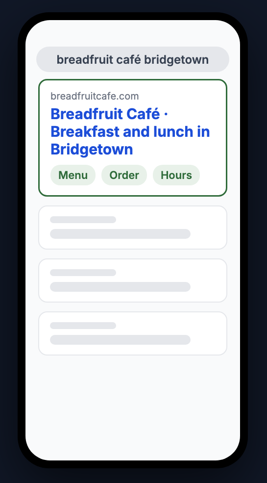 A phone showing a search result for Breadfruit Café, an example business